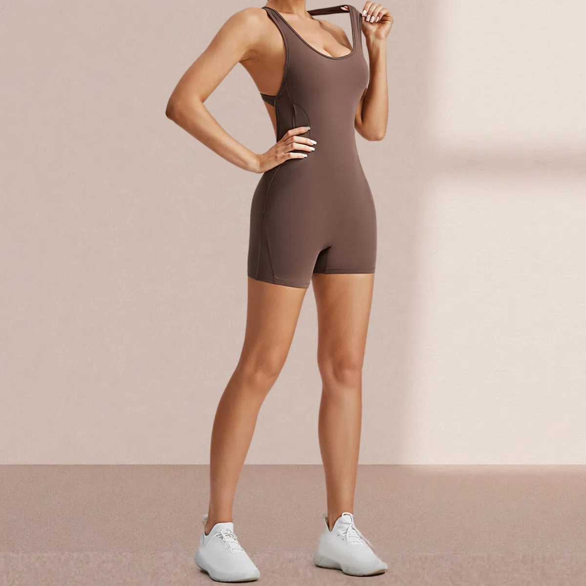 Tute da palestra da donna di un pezzo, abiti da allenamento ad alta elasticità, body aderenti in eleganti nero e marrone, abbigliamento sportivo