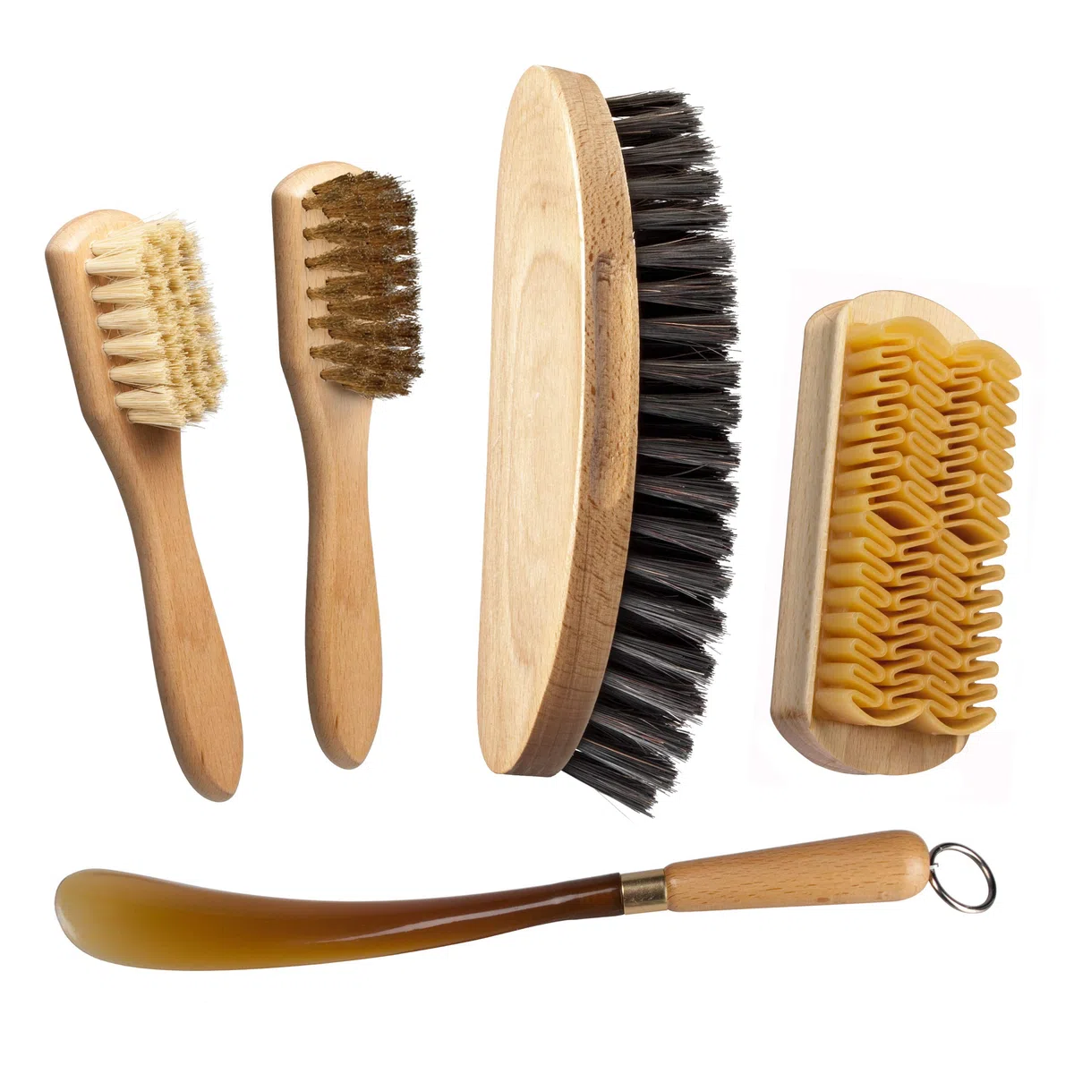 set per la pulizia e la cura delle scarpe. Spazzolino spandilucido + spazzolino per camoscio + spazzola per nabuk + spazzola grande in crine rinforzato + calzante. Ottimo per stivali emu e ugg.