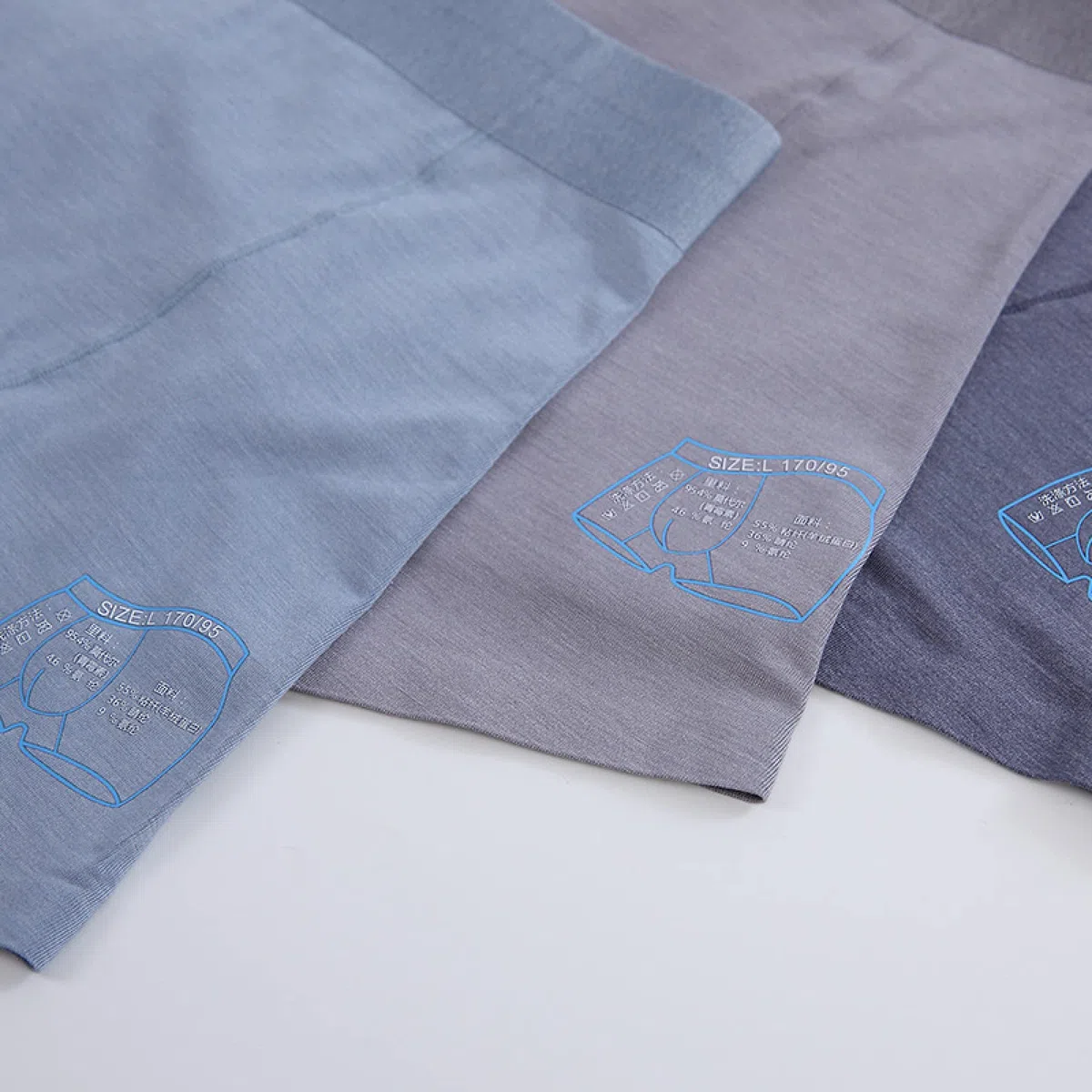 HIONRE Slip di seta senza cuciture del ferro per gli uomini, T-pants senza cuciture degli uomini, biancheria intima comoda tinta unita, grigio, 2XL, perizoma Multipack uomini
